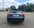 Синій Опель Інсігнія, об'ємом двигуна 2 л та пробігом 235 тис. км за 7116 $, фото 3 на Automoto.ua