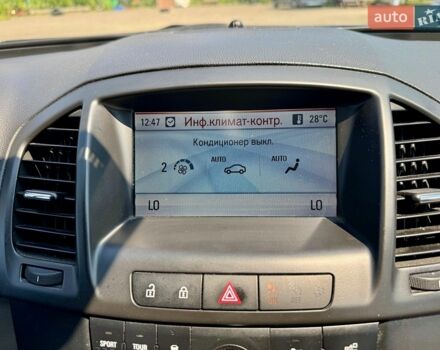Синій Опель Інсігнія, об'ємом двигуна 2 л та пробігом 219 тис. км за 7499 $, фото 18 на Automoto.ua