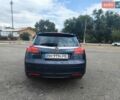 Синій Опель Інсігнія, об'ємом двигуна 2 л та пробігом 235 тис. км за 7100 $, фото 5 на Automoto.ua