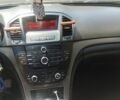 Синий Опель Инсигния, объемом двигателя 1.96 л и пробегом 305 тыс. км за 5500 $, фото 7 на Automoto.ua