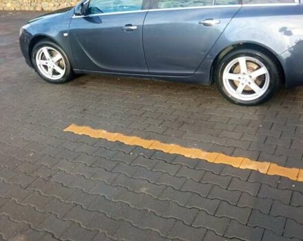 Синий Опель Инсигния, объемом двигателя 2 л и пробегом 238 тыс. км за 8800 $, фото 3 на Automoto.ua