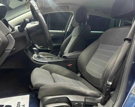 Синий Опель Инсигния, объемом двигателя 2 л и пробегом 211 тыс. км за 8800 $, фото 6 на Automoto.ua