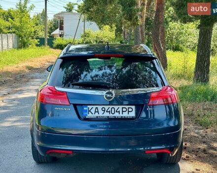 Синій Опель Інсігнія, об'ємом двигуна 2 л та пробігом 219 тис. км за 7499 $, фото 4 на Automoto.ua