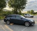 Синий Опель Инсигния, объемом двигателя 2 л и пробегом 340 тыс. км за 8000 $, фото 4 на Automoto.ua