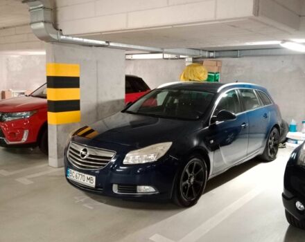 Синий Опель Инсигния, объемом двигателя 2 л и пробегом 355 тыс. км за 6900 $, фото 2 на Automoto.ua