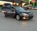 Синій Опель Інсігнія, об'ємом двигуна 2 л та пробігом 241 тис. км за 5999 $, фото 4 на Automoto.ua