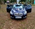 Синий Опель Инсигния, объемом двигателя 2 л и пробегом 303 тыс. км за 7700 $, фото 1 на Automoto.ua