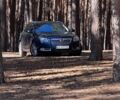 Синій Опель Інсігнія, об'ємом двигуна 2 л та пробігом 200 тис. км за 6709 $, фото 2 на Automoto.ua