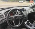 Синій Опель Інсігнія, об'ємом двигуна 2 л та пробігом 235 тис. км за 7100 $, фото 1 на Automoto.ua