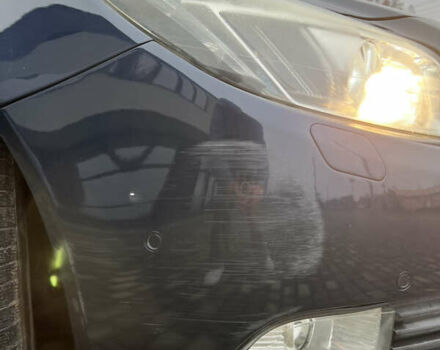 Синий Опель Инсигния, объемом двигателя 1.96 л и пробегом 246 тыс. км за 7200 $, фото 5 на Automoto.ua