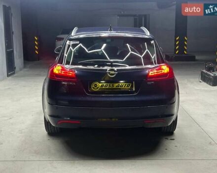 Синий Опель Инсигния, объемом двигателя 2 л и пробегом 211 тыс. км за 8800 $, фото 4 на Automoto.ua