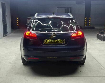 Синий Опель Инсигния, объемом двигателя 2 л и пробегом 211 тыс. км за 8800 $, фото 4 на Automoto.ua