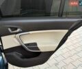 Синій Опель Інсігнія, об'ємом двигуна 2 л та пробігом 241 тис. км за 5999 $, фото 39 на Automoto.ua