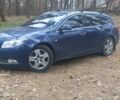 Синий Опель Инсигния, объемом двигателя 2 л и пробегом 290 тыс. км за 8000 $, фото 3 на Automoto.ua