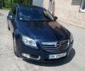 Синий Опель Инсигния, объемом двигателя 2 л и пробегом 240 тыс. км за 8350 $, фото 1 на Automoto.ua