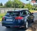 Синій Опель Інсігнія, об'ємом двигуна 1.96 л та пробігом 230 тис. км за 7900 $, фото 4 на Automoto.ua
