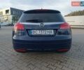 Синий Опель Инсигния, объемом двигателя 1.96 л и пробегом 259 тыс. км за 7850 $, фото 6 на Automoto.ua