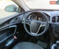 Синий Опель Инсигния, объемом двигателя 2 л и пробегом 230 тыс. км за 6400 $, фото 4 на Automoto.ua