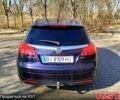 Синий Опель Инсигния, объемом двигателя 2 л и пробегом 257 тыс. км за 8000 $, фото 5 на Automoto.ua