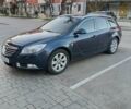 Синий Опель Инсигния, объемом двигателя 2 л и пробегом 250 тыс. км за 7500 $, фото 1 на Automoto.ua