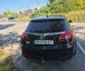 Синий Опель Инсигния, объемом двигателя 1.96 л и пробегом 265 тыс. км за 6500 $, фото 5 на Automoto.ua