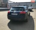Синий Опель Инсигния, объемом двигателя 2 л и пробегом 236 тыс. км за 14500 $, фото 2 на Automoto.ua