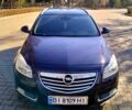 Синий Опель Инсигния, объемом двигателя 2 л и пробегом 257 тыс. км за 8000 $, фото 1 на Automoto.ua