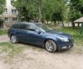 Синий Опель Инсигния, объемом двигателя 2 л и пробегом 218 тыс. км за 8800 $, фото 1 на Automoto.ua