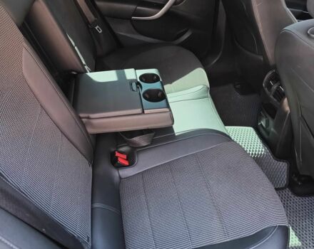 Синий Опель Инсигния, объемом двигателя 2 л и пробегом 201 тыс. км за 9200 $, фото 4 на Automoto.ua