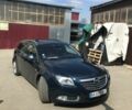 Синий Опель Инсигния, объемом двигателя 2 л и пробегом 236 тыс. км за 14500 $, фото 1 на Automoto.ua