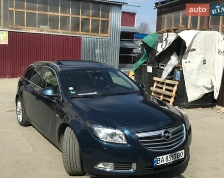 Синий Опель Инсигния, объемом двигателя 2 л и пробегом 236 тыс. км за 14500 $, фото 1 на Automoto.ua
