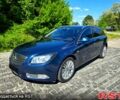 Синий Опель Инсигния, объемом двигателя 2 л и пробегом 183 тыс. км за 7500 $, фото 1 на Automoto.ua