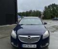 Синий Опель Инсигния, объемом двигателя 2 л и пробегом 296 тыс. км за 6900 $, фото 1 на Automoto.ua