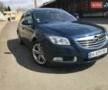 Синий Опель Инсигния, объемом двигателя 2 л и пробегом 236 тыс. км за 14500 $, фото 1 на Automoto.ua