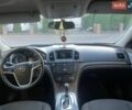 Синий Опель Инсигния, объемом двигателя 1.96 л и пробегом 306 тыс. км за 7000 $, фото 6 на Automoto.ua