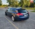 Синій Опель Інсігнія, об'ємом двигуна 1.96 л та пробігом 200 тис. км за 9779 $, фото 7 на Automoto.ua