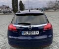 Синій Опель Інсігнія, об'ємом двигуна 2 л та пробігом 300 тис. км за 7400 $, фото 3 на Automoto.ua