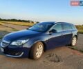 Синій Опель Інсігнія, об'ємом двигуна 2 л та пробігом 216 тис. км за 9500 $, фото 2 на Automoto.ua