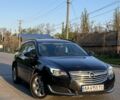 Синий Опель Инсигния, объемом двигателя 2 л и пробегом 319 тыс. км за 8500 $, фото 4 на Automoto.ua