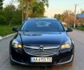 Синий Опель Инсигния, объемом двигателя 2 л и пробегом 319 тыс. км за 7500 $, фото 2 на Automoto.ua
