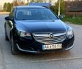 Синий Опель Инсигния, объемом двигателя 2 л и пробегом 319 тыс. км за 7500 $, фото 3 на Automoto.ua