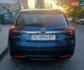 Синий Опель Инсигния, объемом двигателя 1.96 л и пробегом 270 тыс. км за 9800 $, фото 2 на Automoto.ua