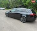 Синий Опель Инсигния, объемом двигателя 2 л и пробегом 260 тыс. км за 9800 $, фото 3 на Automoto.ua