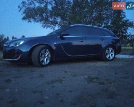 Синий Опель Инсигния, объемом двигателя 2 л и пробегом 200 тыс. км за 9500 $, фото 1 на Automoto.ua