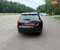 Синий Опель Инсигния, объемом двигателя 2 л и пробегом 260 тыс. км за 9800 $, фото 5 на Automoto.ua