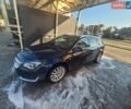 Синий Опель Инсигния, объемом двигателя 2 л и пробегом 250 тыс. км за 9908 $, фото 4 на Automoto.ua