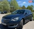 Синий Опель Инсигния, объемом двигателя 2 л и пробегом 283 тыс. км за 9600 $, фото 1 на Automoto.ua