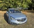 Синий Опель Инсигния, объемом двигателя 2 л и пробегом 169 тыс. км за 12500 $, фото 1 на Automoto.ua