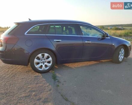 Синий Опель Инсигния, объемом двигателя 2 л и пробегом 216 тыс. км за 9500 $, фото 2 на Automoto.ua