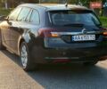 Синий Опель Инсигния, объемом двигателя 1.96 л и пробегом 319 тыс. км за 8000 $, фото 4 на Automoto.ua